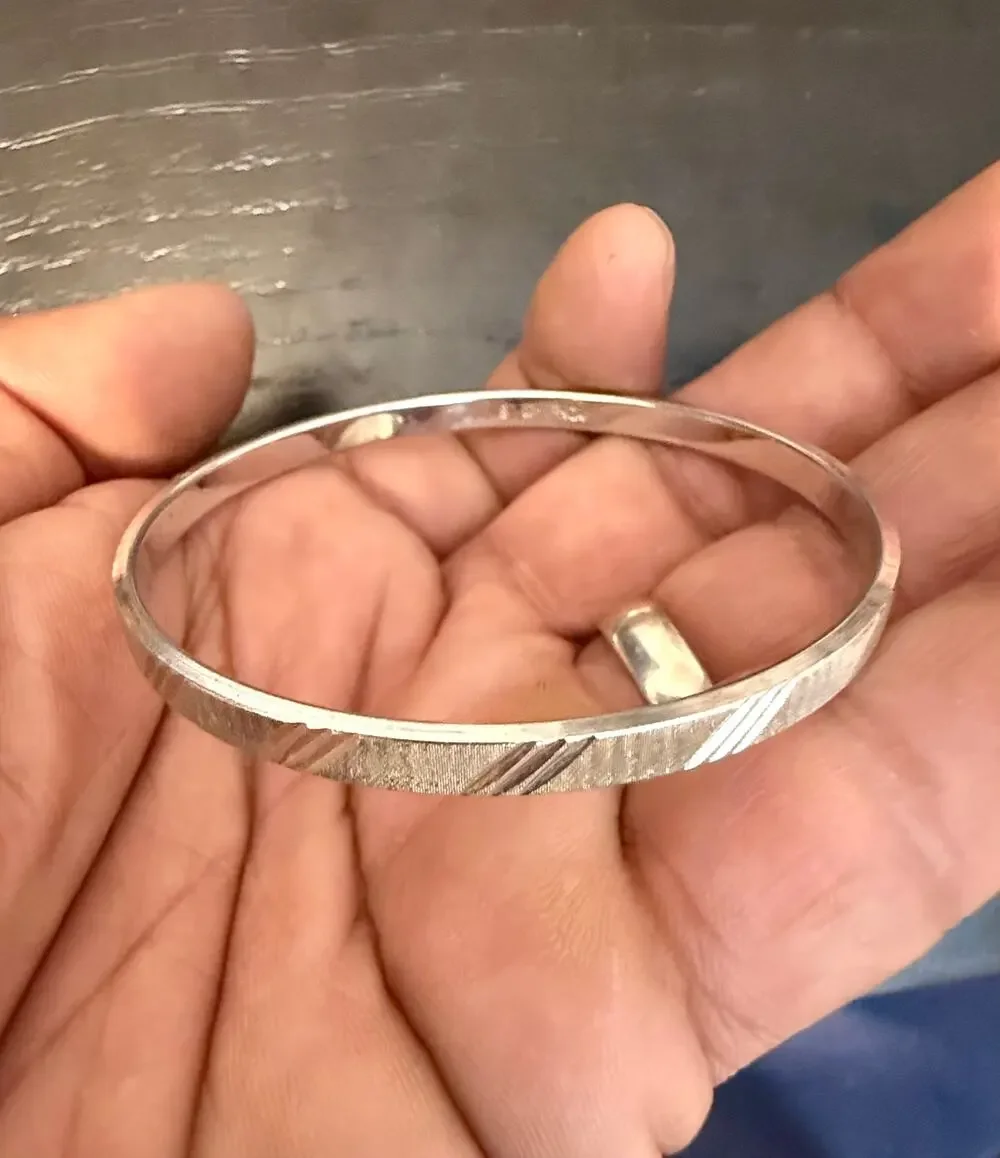 Vintage Signed Monet Silver Tone Etched Bangle Bracelet 7.5“